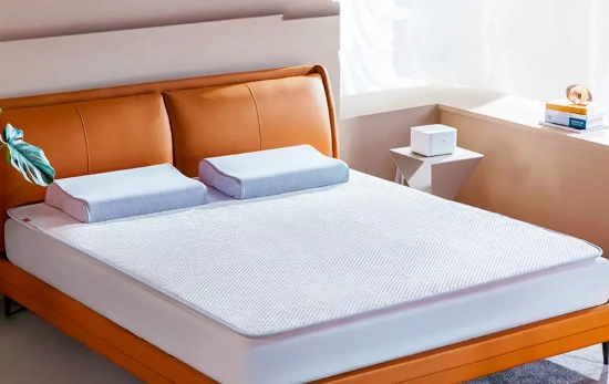 Una cama con la nueva manta de Xiaomi / XIAOMI