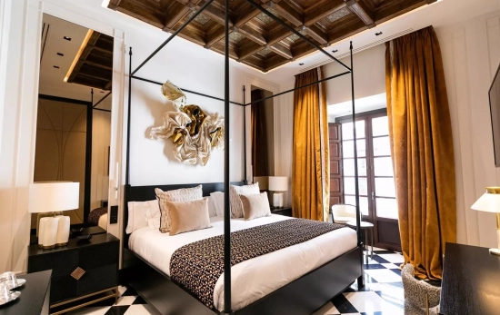 Una de las lujosas habitaciones de Casa Palacio Sevilla / CPDR Una de las lujosas habitaciones de Casa Palacio Sevilla / CPDR