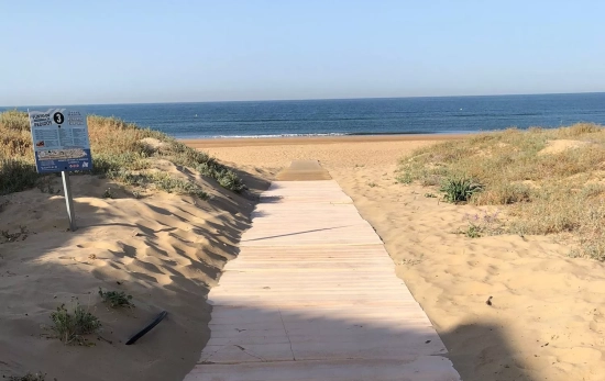 Acceso a la Playa de El Portil / AYUNTAMIENTO DE PUERTA UMBRIA Acceso a la Playa de El Portil / AYUNTAMIENTO DE PUERTA UMBRIA