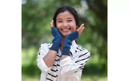 Una persona con un complemento de la marca / MUTITAA