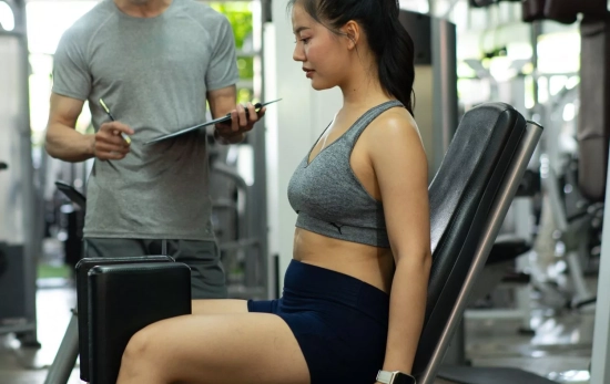 Una persona en el gimnasio/ CANVA