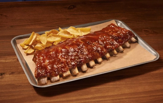 Costillas de cerdo / FOSTER'S HOLLYWOOD Costillas de cerdo / FOSTER'S HOLLYWOOD