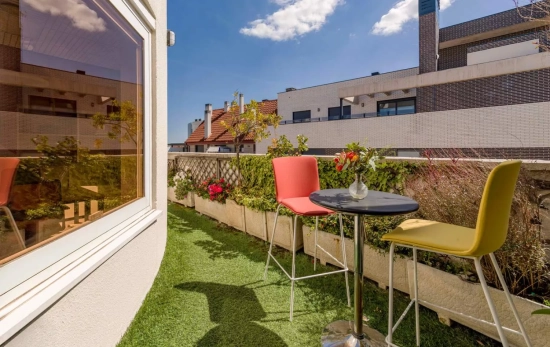 Una vista de la terraza  / OPTIMISMUS