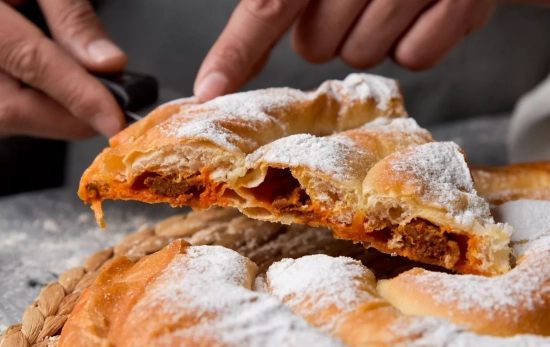 Sobrasada en empanada/ CANVA Sobrasada en empanada/ CANVA